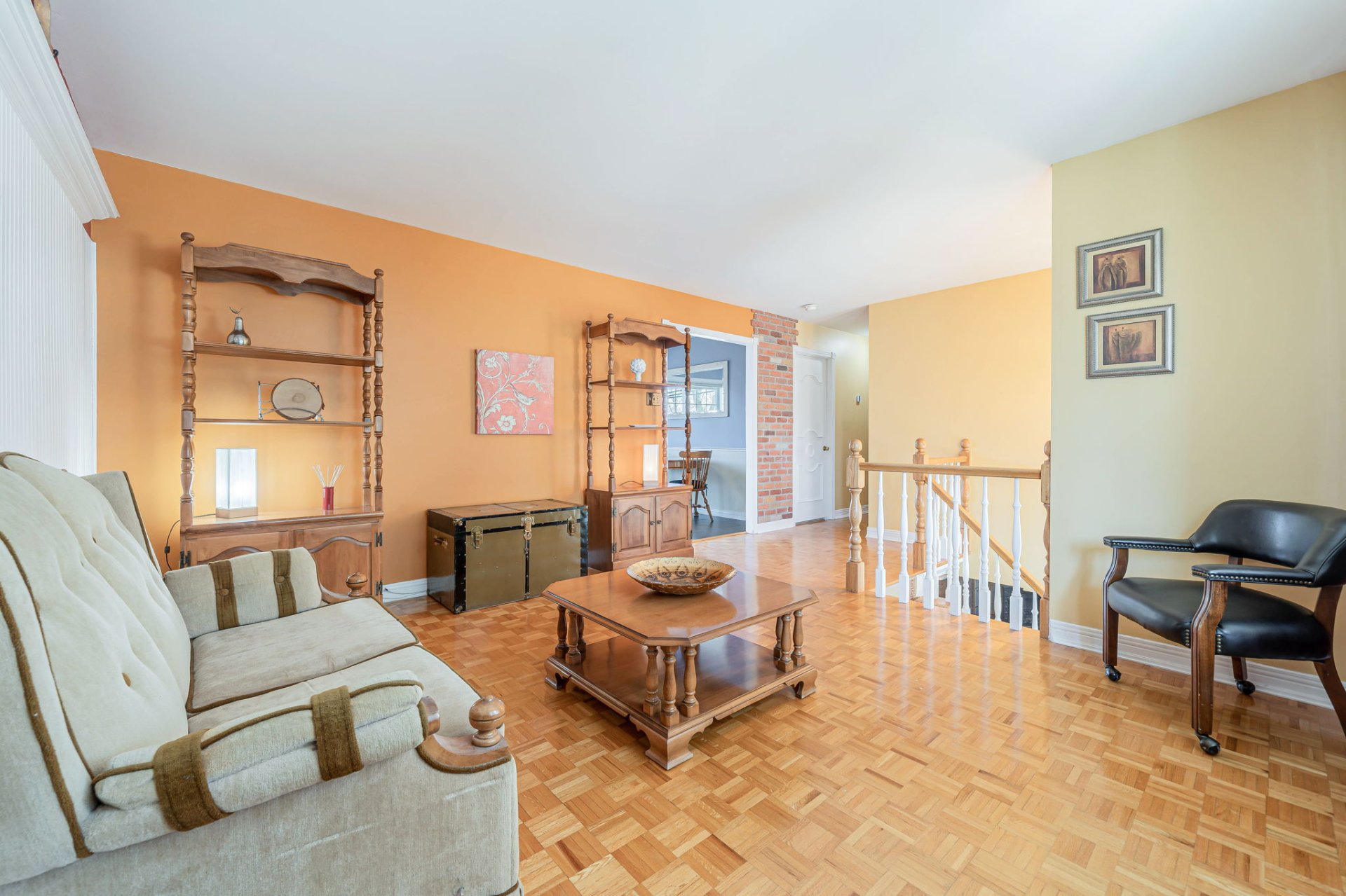 Open-concept living and dining area in Montreal property 915 Boulevard de Chateauneuf