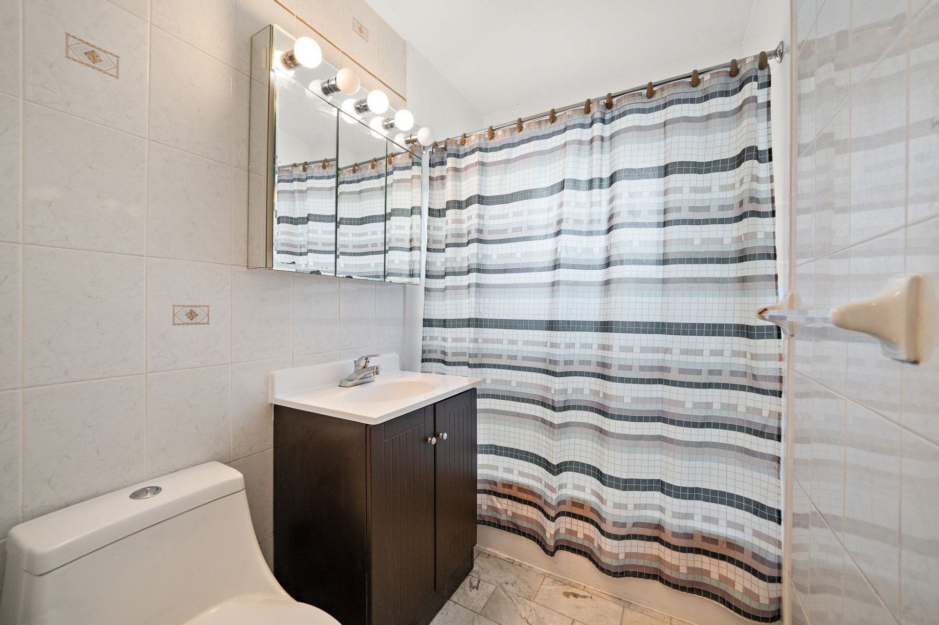 Outdoor patio space at Rue Lake Montreal listing